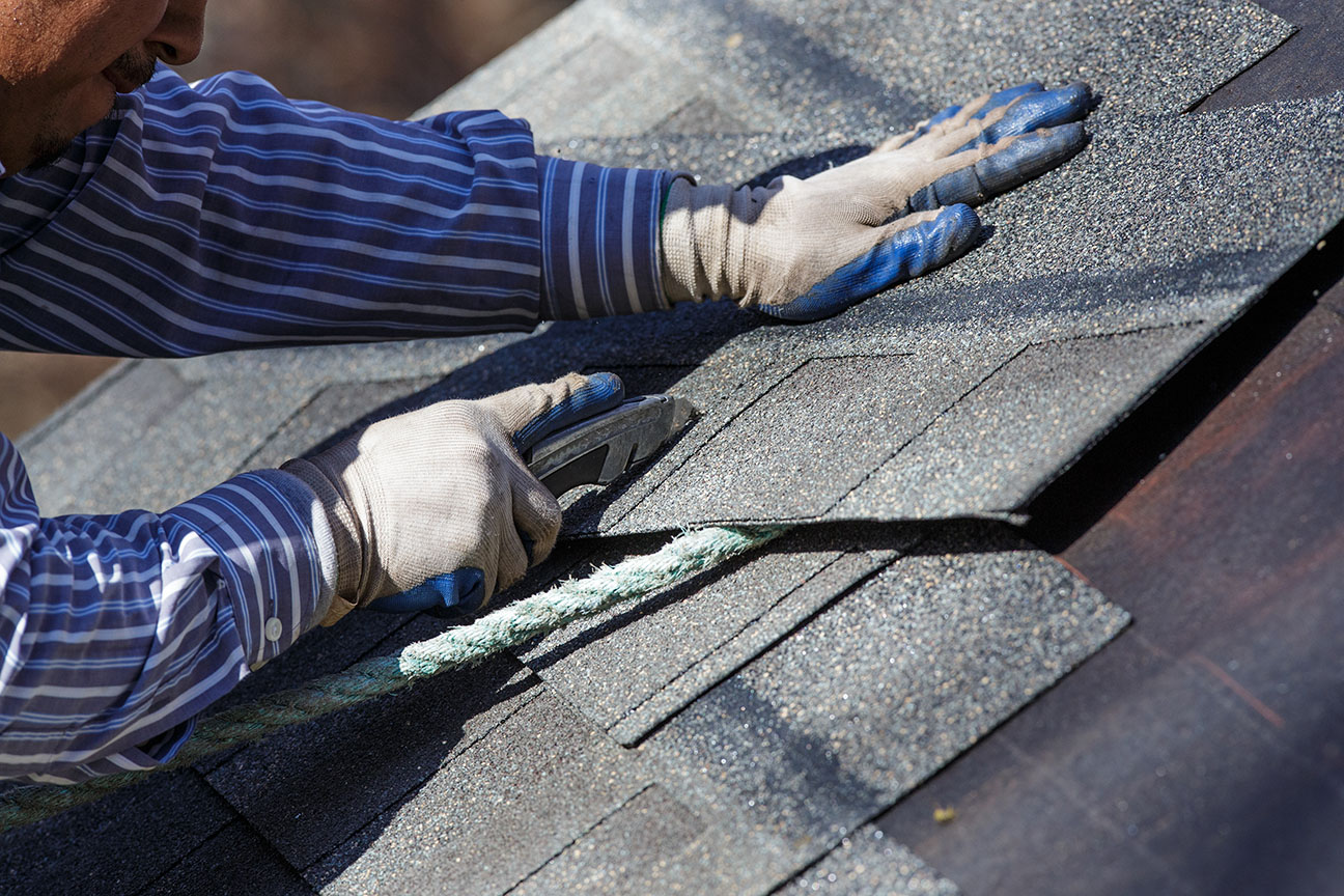 Cutting Shingle to Fit In order to fit properly shingles are cut.